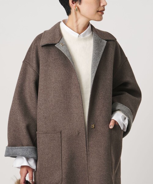 UNITED ARROWS(ユナイテッドアローズ)の「バイカラー リバー ステンカラー コート(ステンカラーコート・レディース・その他1/オフホワイト/ネイビー・36/38)」の15枚目の写真