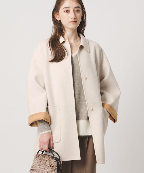 UNITED ARROWS(ユナイテッドアローズ)の「バイカラー リバー ステンカラー コート(ステンカラーコート・レディース・その他1/オフホワイト/ネイビー・36/38)」の18枚目の写真
