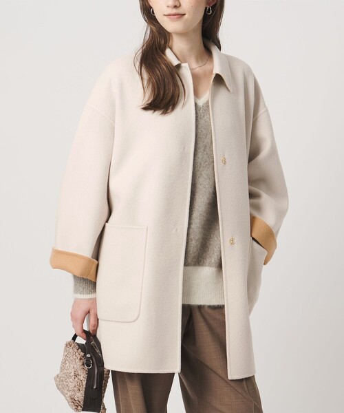 UNITED ARROWS(ユナイテッドアローズ)の「バイカラー リバー ステンカラー コート(ステンカラーコート・レディース・その他1/オフホワイト/ネイビー・36/38)」の20枚目の写真