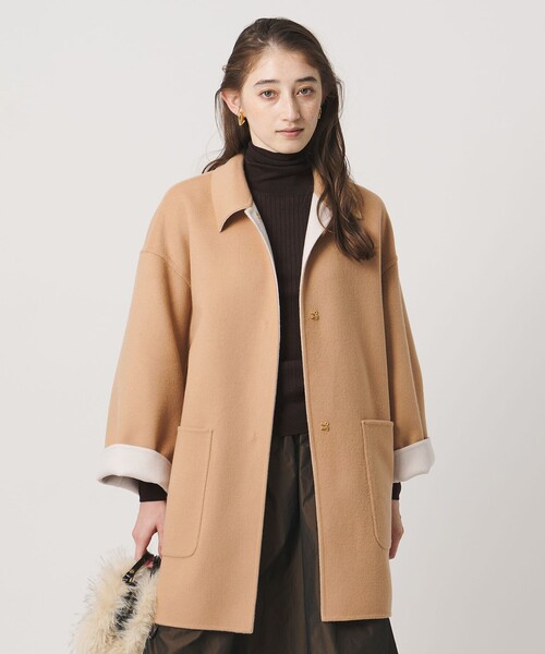 UNITED ARROWS(ユナイテッドアローズ)の「バイカラー リバー ステンカラー コート(ステンカラーコート・レディース・その他1/オフホワイト/ネイビー・36/38)」の21枚目の写真