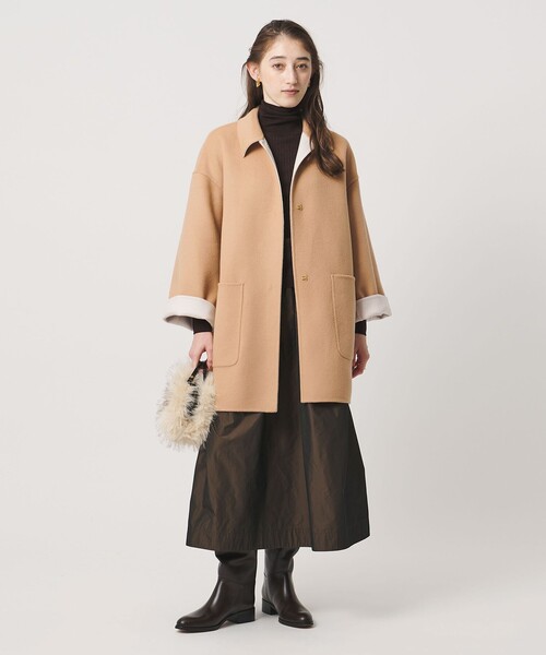 UNITED ARROWS(ユナイテッドアローズ)の「バイカラー リバー ステンカラー コート(ステンカラーコート・レディース・その他1/オフホワイト/ネイビー・36/38)」の22枚目の写真