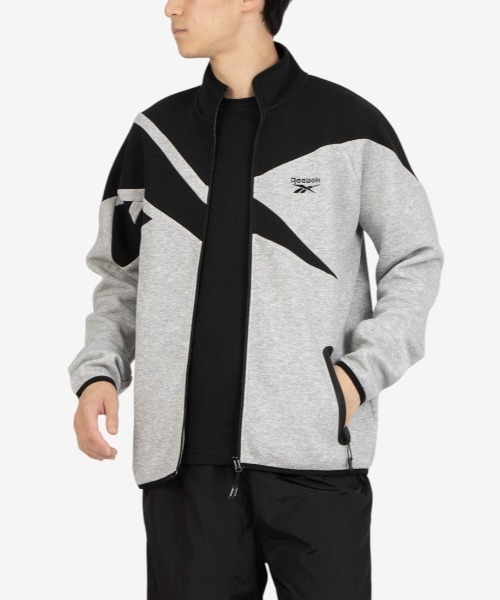 Reebok(リーボック)の「ビッグベクター ジャケット / CONTRAST PANEL FUNNELNECK JACKET(ジャージ・メンズ・アーミー/チャコールグレー×ブラック/グレー・X-LARGE/SMALL/MEDIUM/LARGE)」の3枚目の写真