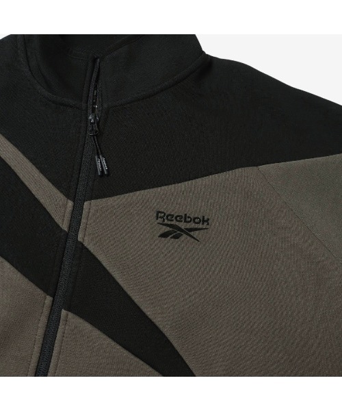 Reebok(リーボック)の「ビッグベクター ジャケット / CONTRAST PANEL FUNNELNECK JACKET(ジャージ・メンズ・アーミー/チャコールグレー×ブラック/グレー・X-LARGE/SMALL/MEDIUM/LARGE)」の13枚目の写真