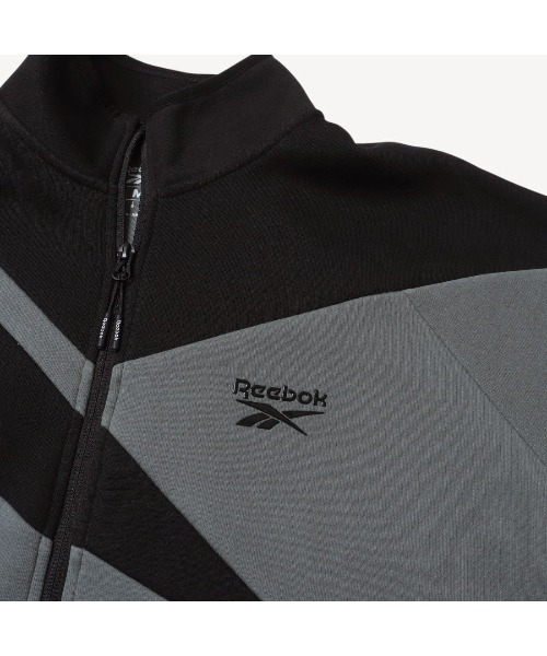 Reebok(リーボック)の「ビッグベクター ジャケット / CONTRAST PANEL FUNNELNECK JACKET(ジャージ・メンズ・アーミー/チャコールグレー×ブラック/グレー・X-LARGE/SMALL/MEDIUM/LARGE)」の19枚目の写真
