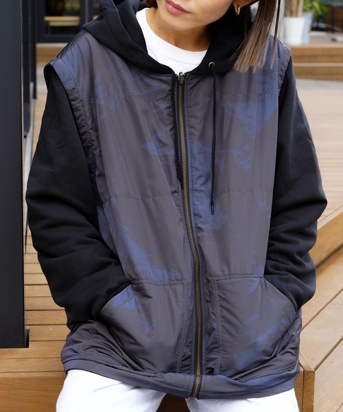 RVCA(ルーカ)の「RVCA メンズ GRANT PUFFER REVERSIBLE ZIP HD パーカー 【2025年秋冬モデル】/ルーカリバーシブルジップアップパーカー・フーディー(SET UP・セットアップ可能・空港コーデ)(パーカー・メンズ・ブラウン系カモフラージュ/ブラック/ブラック系その他・X-LARGE/LARGE/MEDIUM/SMALL)」の1枚目の写真