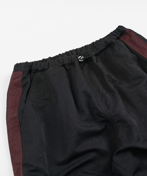 FRIZMWORKS(フリズムワークス)の「STRING NYLON TRACK PANTS _ BLACK(スウェットパンツ・メンズ・その他・SMALL/MEDIUM/LARGE/X-LARGE)」の3枚目の写真