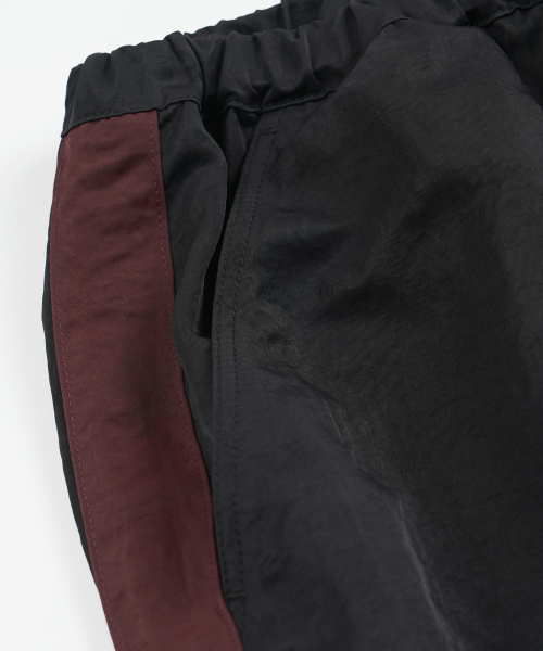 FRIZMWORKS(フリズムワークス)の「STRING NYLON TRACK PANTS _ BLACK(スウェットパンツ・メンズ・その他・SMALL/MEDIUM/LARGE/X-LARGE)」の4枚目の写真
