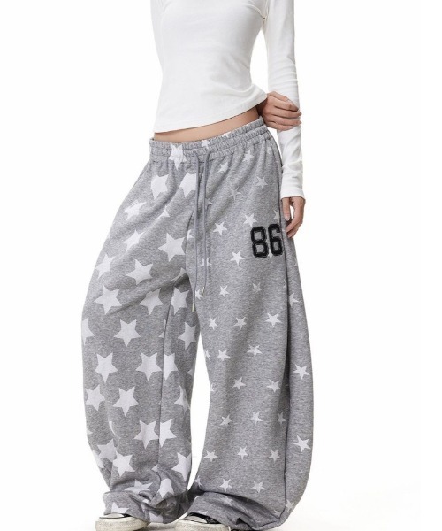 Ritzy(リッツィー)の「星柄 ×プリント ルーズスウェットパンツ(スウェットパンツ・レディース・ライトグレー・M)」の1枚目の写真