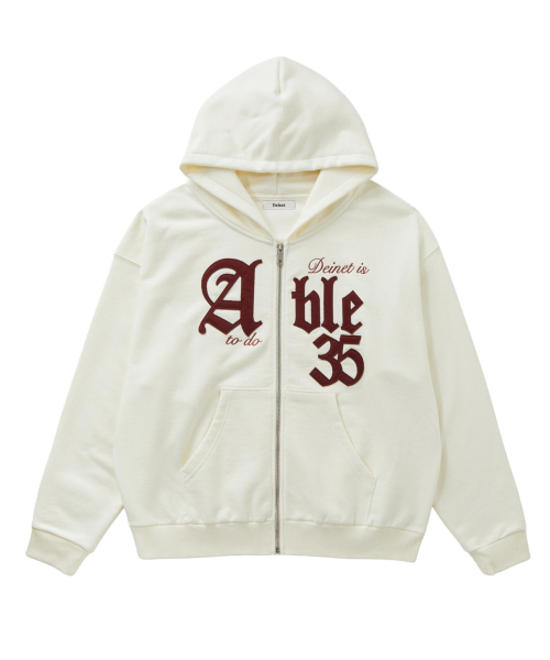 DEINET(ダイニット)の「APPLIQUE ABLE OVERSIZE HOOD ZIP UP IN IVORY(パーカー・レディース・その他・FREE)」の1枚目の写真