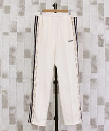 NERDY（ノルディ）の「NERDY シンボルパターントラックパンツ Symbol Pattern Block Track Pants（スウェットパンツ）」