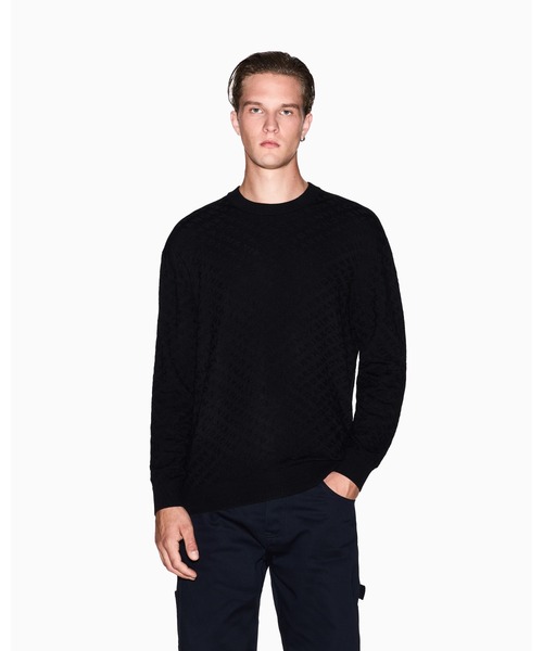ARMANI EXCHANGE(アルマーニエクスチェンジ)の「【A|X アルマーニ エクスチェンジ】オールオーバージャカードロゴ ニットプルオーバー(ニット/セーター・メンズ・ブラック・SMALL/X-LARGE/X-SMALL/LARGE/MEDIUM)」の1枚目の写真