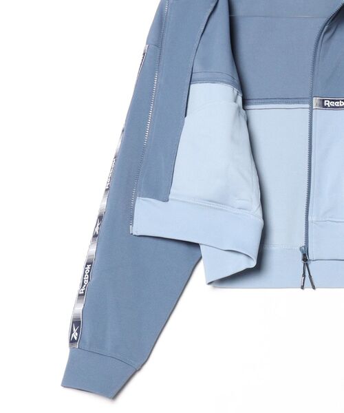 Reebok（リーボック）の「クロップド トラックジャケット / CROPPED TRACK JACKET（ジャージ・レディース・ネイビー/クリアブルー・X-SMALL/SMALL/MEDIUM）」の18枚目の写真
