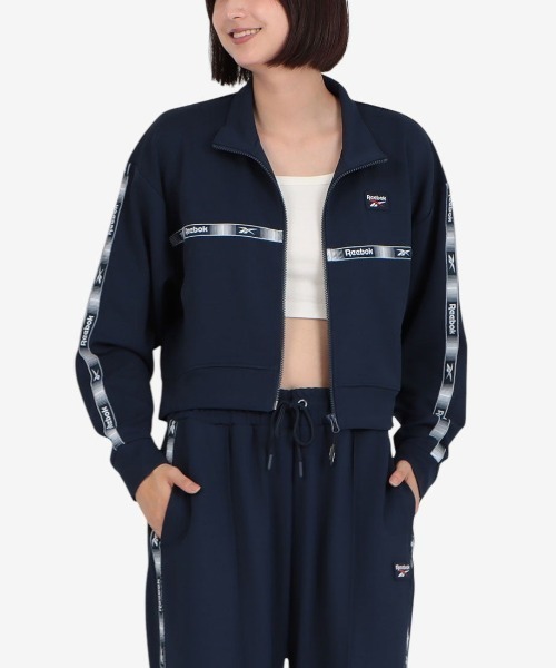 Reebok（リーボック）の「クロップド トラックジャケット / CROPPED TRACK JACKET（ジャージ・レディース・ネイビー/クリアブルー・X-SMALL/SMALL/MEDIUM）」の2枚目の写真