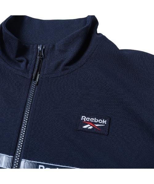 Reebok（リーボック）の「クロップド トラックジャケット / CROPPED TRACK JACKET（ジャージ・レディース・ネイビー/クリアブルー・X-SMALL/SMALL/MEDIUM）」の7枚目の写真