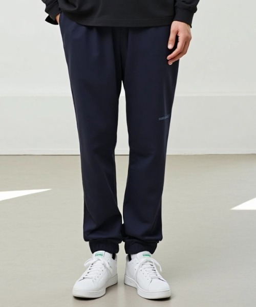 CONVERSE(コンバース)の「CONVERSE/コンバース ナイロン ストレッチ 撥水 テーパード ジョガーパンツ(その他パンツ・メンズ・グレー/ネイビー/ブラック・LL/M/L)」の3枚目の写真
