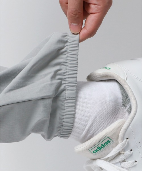 CONVERSE(コンバース)の「CONVERSE/コンバース ナイロン ストレッチ 撥水 テーパード ジョガーパンツ(その他パンツ・メンズ・グレー/ネイビー/ブラック・LL/M/L)」の19枚目の写真