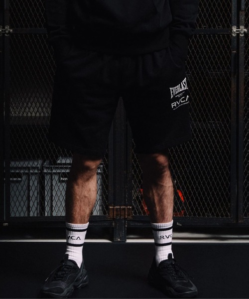 RVCA(ルーカ)の「RVCA メンズ RVCA×EVERLAST SHORTS ショートパンツ 【2025年秋冬モデル】/ルーカエバーラストコラボスウェットショーツ(SET UP・セットアップ対応可能・空港コーデ)(その他パンツ・メンズ・ホワイト系その他/ブラック/ヘザーグレー・SMALL/MEDIUM/X-LARGE/LARGE)」の1枚目の写真