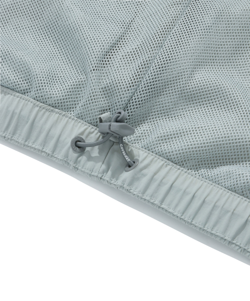 COVERNAT（カバーナット）の「コンフィナイロンウィンドブレーカー ジャンパー ライトグレー（ナイロンジャケット・レディース・その他・X-SMALL/XX-LARGE/LARGE/MEDIUM/SMALL/X-LARGE）」の12枚目の写真