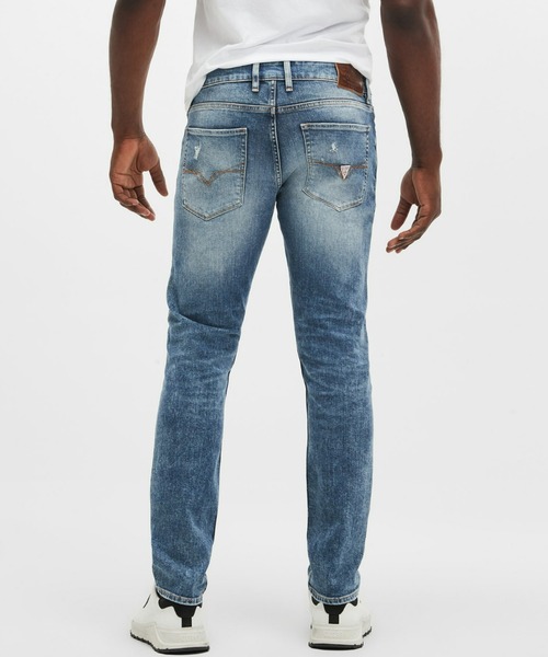Guess(ゲス)の「Eco Slim Tapered Jeans(デニムパンツ・メンズ・インディゴブルー・29inch/30inch/31inch/32inch)」の2枚目の写真