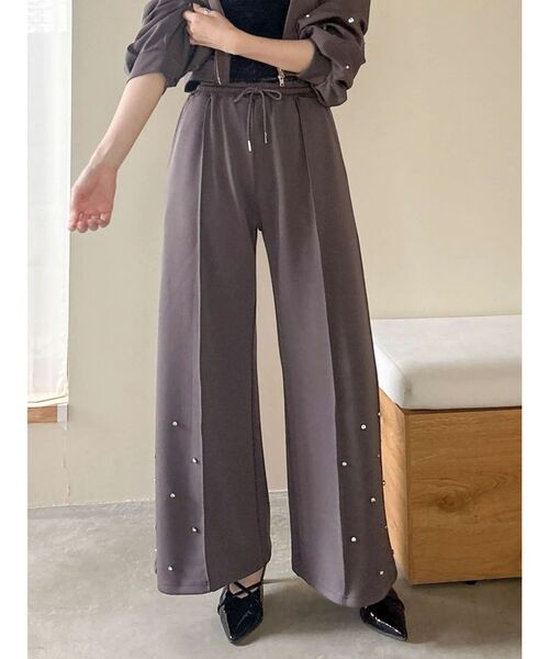 dazzlin(ダズリン)の「ヘムビジュースウェットパンツ(スウェットパンツ・レディース・ブラウン/ピンク/アイボリー・MEDIUM/SMALL)」の1枚目の写真