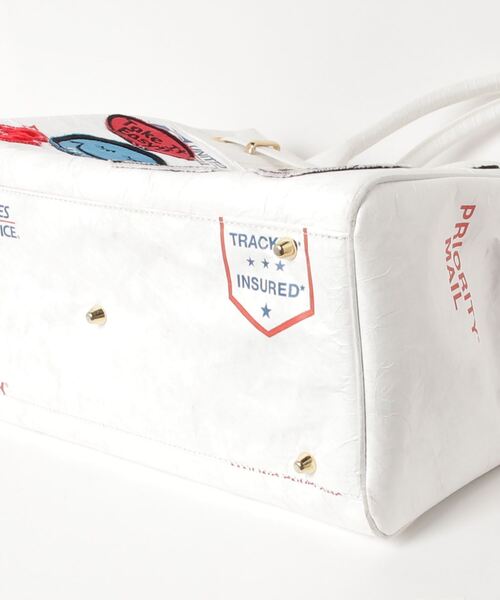 Firsthand（ファーストハンド）の「A LOVE MOVEMENT / ア ラブ ムーブメント　ペーパーバッグ 中（ハンドバッグ・メンズ・ホワイト・ﾌﾘ-）」の3枚目の写真