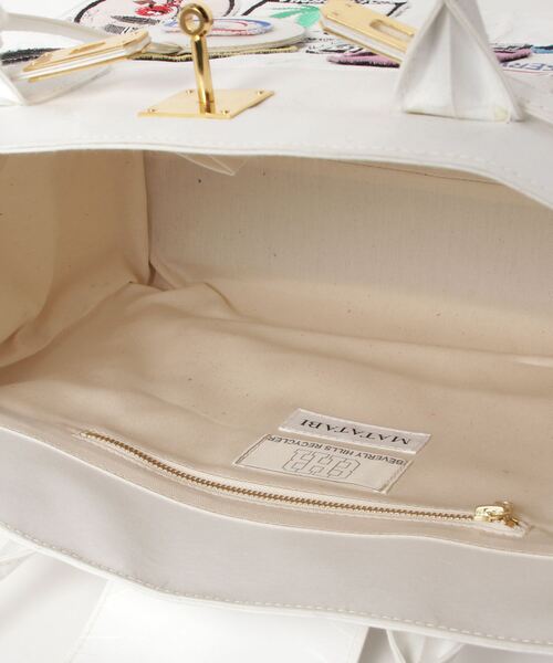 Firsthand（ファーストハンド）の「A LOVE MOVEMENT / ア ラブ ムーブメント　ペーパーバッグ 中（ハンドバッグ・メンズ・ホワイト・ﾌﾘ-）」の4枚目の写真