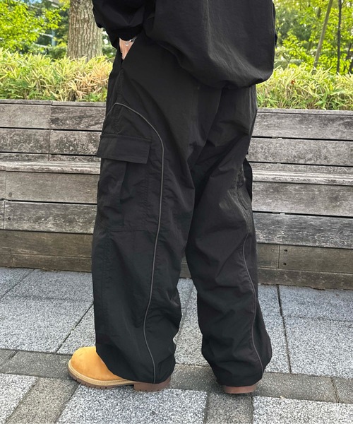 sedacle（セダクル）の「パイピングナイロンカーゴパンツ【SETUP着用