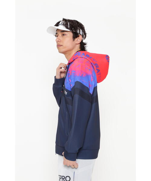 パーリーゲイツ ロゴグラデパネルプリント フーディ PEARLY GATES（パーリーゲイツ）の「【PEARLY GATES】ロゴグラデパネル