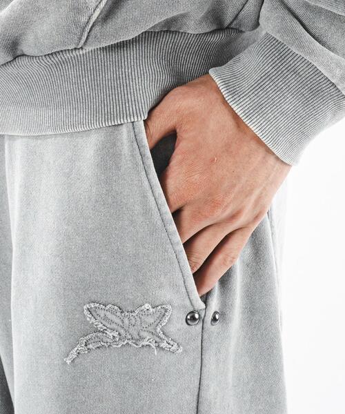 SHORT ROUND（ショートラウンド）の「SHORT ROUND/ブリーチスタッズロゴスウェットパンツ（スウェットパンツ・メンズ・スミクロ/グレー・LARGE/MEDIUM）」の3枚目の写真