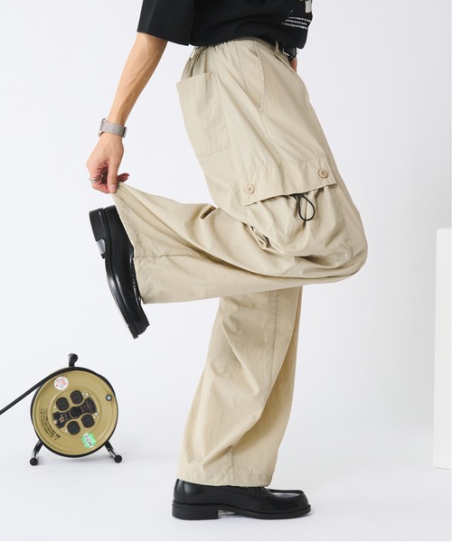 Adoon plain（アドーンプレーン）の「ナイロンドローコードワイドカーゴパンツ（カーゴパンツ・メンズ・ブラック/アイボリー・MEDIUM/LARGE）」の2枚目の写真