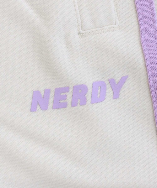 NERDY(ノルディ)の「NERDY バイカラーメンズトラックパンツ NY BICOLOR MEN'S TRACK PANTS(スウェットパンツ・メンズ・クリーム・M/L)」の4枚目の写真