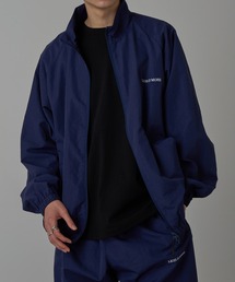 セットアップ」に該当するナイロンジャケット（ブルー・ネイビー/青色