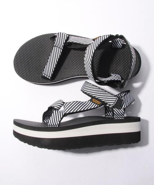 Teva(テバ)の「テバ/OC TEVA FLT-UNIVERSAL(サンダル・レディース・ブラック/その他1・7/5/6/8)」の1枚目の写真
