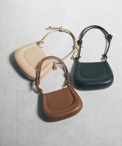 un dix cors(アンディコール)の「スライドハンドルバッグ(ショルダーバッグ・レディース・ブラウン/ベージュ/ブラック・FREE)」の1枚目の写真