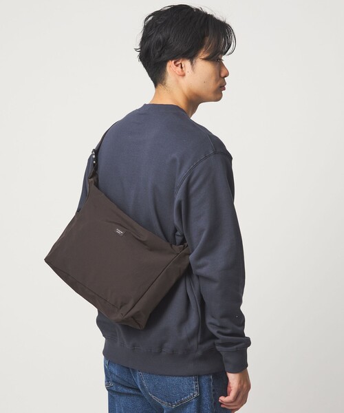 STANDARD SUPPLY(スタンダードサプライ)の「【別注】<STANDARD SUPPLY>GLR トライアングル ショルダーバッグ(ショルダーバッグ・メンズ・ブラック/ダークブラウン・FREE)」の1枚目の写真