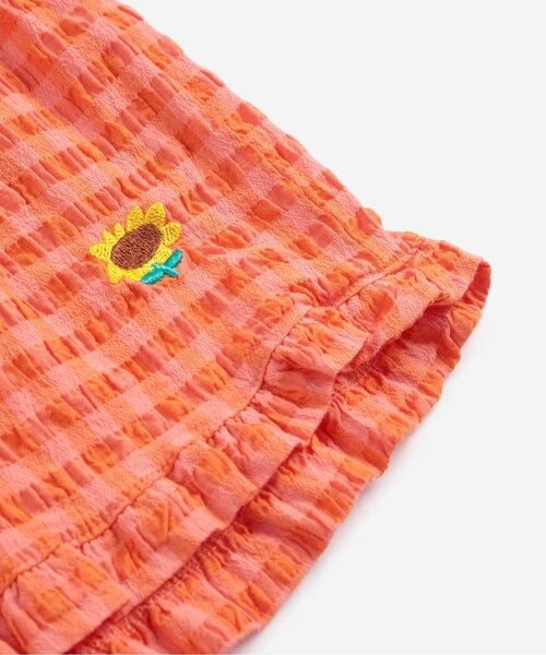 BOBO CHOSES(ボボショーズ)の「Vichy ruffle woven shorts(その他パンツ・キッズ・レッド・110/120/130)」の9枚目の写真