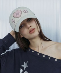 SETUPEXE（セットアップイーエックスイー）の「A'GEM/9 × .kom 『SETUPEXE/セットアップイーエックスイー』 LEO APPLIQUE BALL CAP/レオパードアップリケ刺繍キャップ（キャップ）」