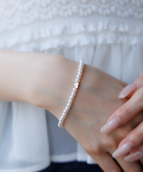 flower(フラワー)の「ポイントハートブレスレット(ブレスレット・レディース・ホワイト・FREE)」の1枚目の写真