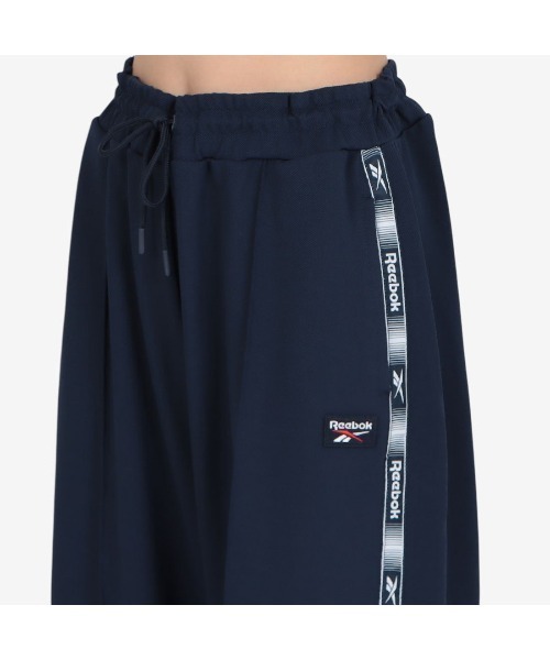 Reebok（リーボック）の「トラックパンツ / TAPED TRACK PANT（その他パンツ・レディース・ネイビー/クリアブルー・X-SMALL/SMALL/MEDIUM）」の16枚目の写真