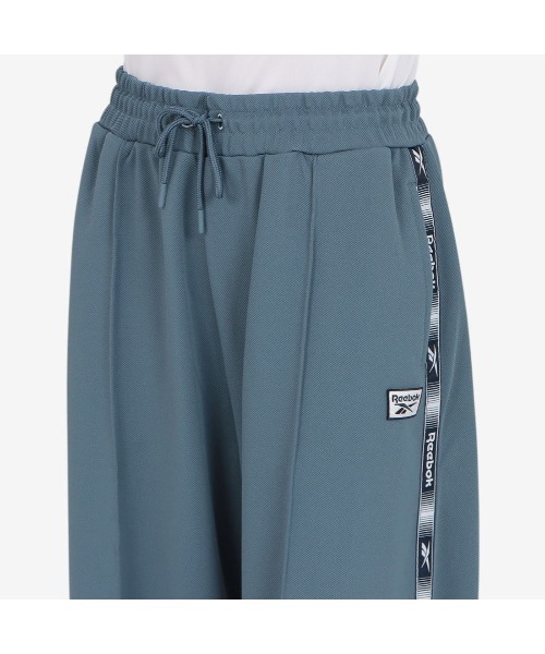 Reebok（リーボック）の「トラックパンツ / TAPED TRACK PANT（その他パンツ・レディース・ネイビー/クリアブルー・X-SMALL/SMALL/MEDIUM）」の5枚目の写真