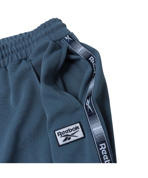Reebok（リーボック）の「トラックパンツ / TAPED TRACK PANT（その他パンツ・レディース・ネイビー/クリアブルー・X-SMALL/SMALL/MEDIUM）」の11枚目の写真