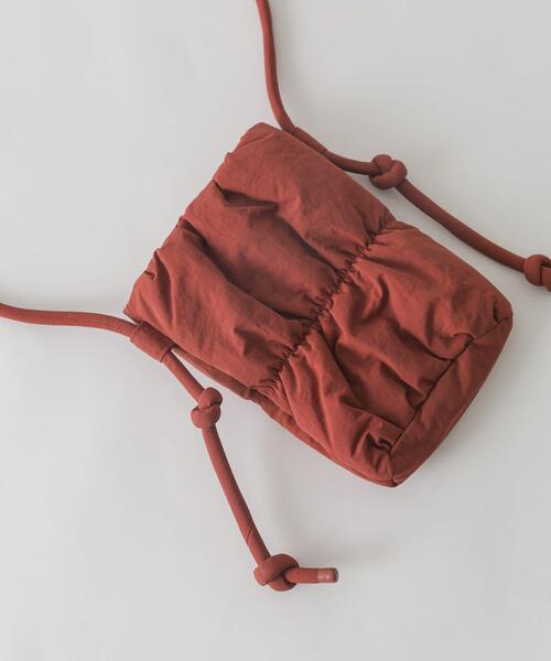 SMELLY（スメリー）の「パフィーミニショルダー（ショルダーバッグ・レディース・ライトブルー/レッド・-）」の13枚目の写真