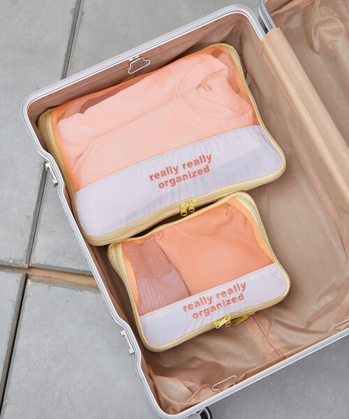 BIRTHDAY BAR(バースデイバー)の「トラベルロゴ刺繍 圧縮ケース Mサイズ(ポーチ・レディース・イエロー/ブルー・0)」の11枚目の写真