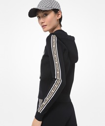 【新品】MICHAEL KORS ロゴテープ フリルジップフーディー　L MICHAEL KORS ロゴテープ フリルジップフーディー