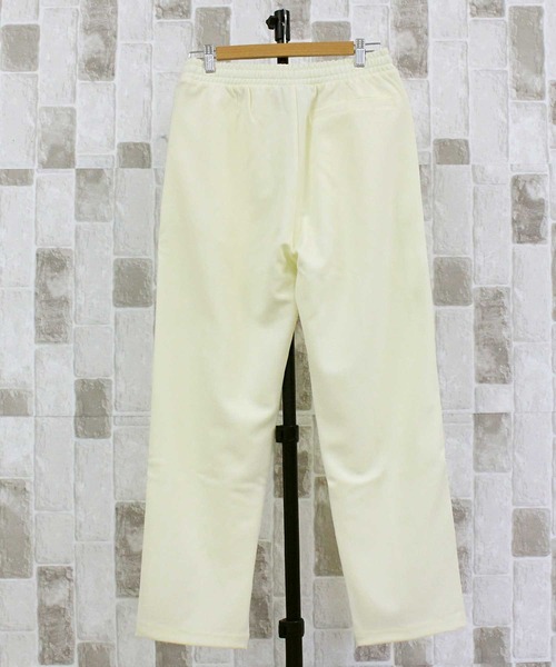 NERDY(ノルディ)の「NERDY チェッカーボードテープトラックパンツ CHECKERBOARD TAPE TRACK PANTS(スウェットパンツ・メンズ・ライトイエロー・M/L)」の2枚目の写真