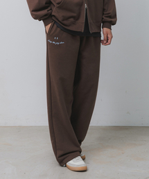 BAKKEN（バッケン）の「スマイル刺繍ロゴセミワイドスウェットパンツ BK9985_ブラウン（スウェットパンツ）」
