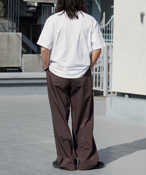 WHITE MOUNTAINEERING(ホワイトマウンテニアリング)の「White Mountaineering/ホワイトマウンテニアリング × Dickies/ディッキーズ WM×Dickies 2 TUCK PANTS ブランドタグ フロントフライ 2タックパンツ 2026年 夏 夏服 秋服(チノパンツ・メンズ・ブラウン/ブラック・3/2/1)」の18枚目の写真