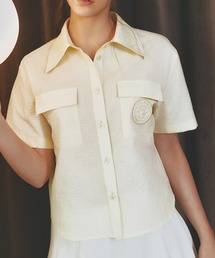 METROCITY（メトロシティ）の「【メトロシティ】La Vita E Bella ラウンド刺繍ワッペンシャツ 綿100% ワンポイント 着心地（シャツ/ブラウス）」