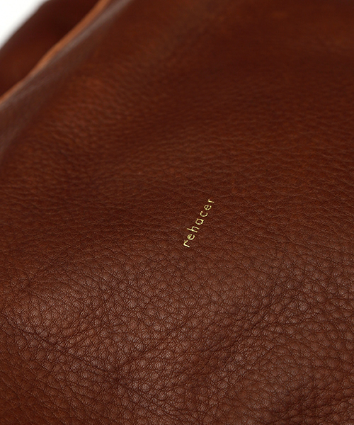 rehacer(レアセル)の「rehacer : Swell leather shoulder bag(ショルダーバッグ・メンズ・ブラウン/ブラック・FREE)」の5枚目の写真