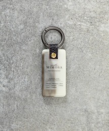 MILLION CARATS（ミリオンカラッツ）の「香り×デザインで心まで満たす《LibCurate》Mimosa WAX。バッグに揺れるたび広がるアロマの余韻で、自分らしさを持ち歩く。気分で選べる色柄と香りが、等身大の日常に小さな幸せをプラス。（チャーム）」